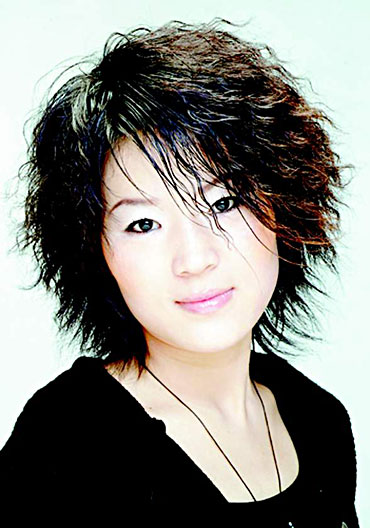 发型制造:烟花烫对于制造蓬松爆炸的效果再好不